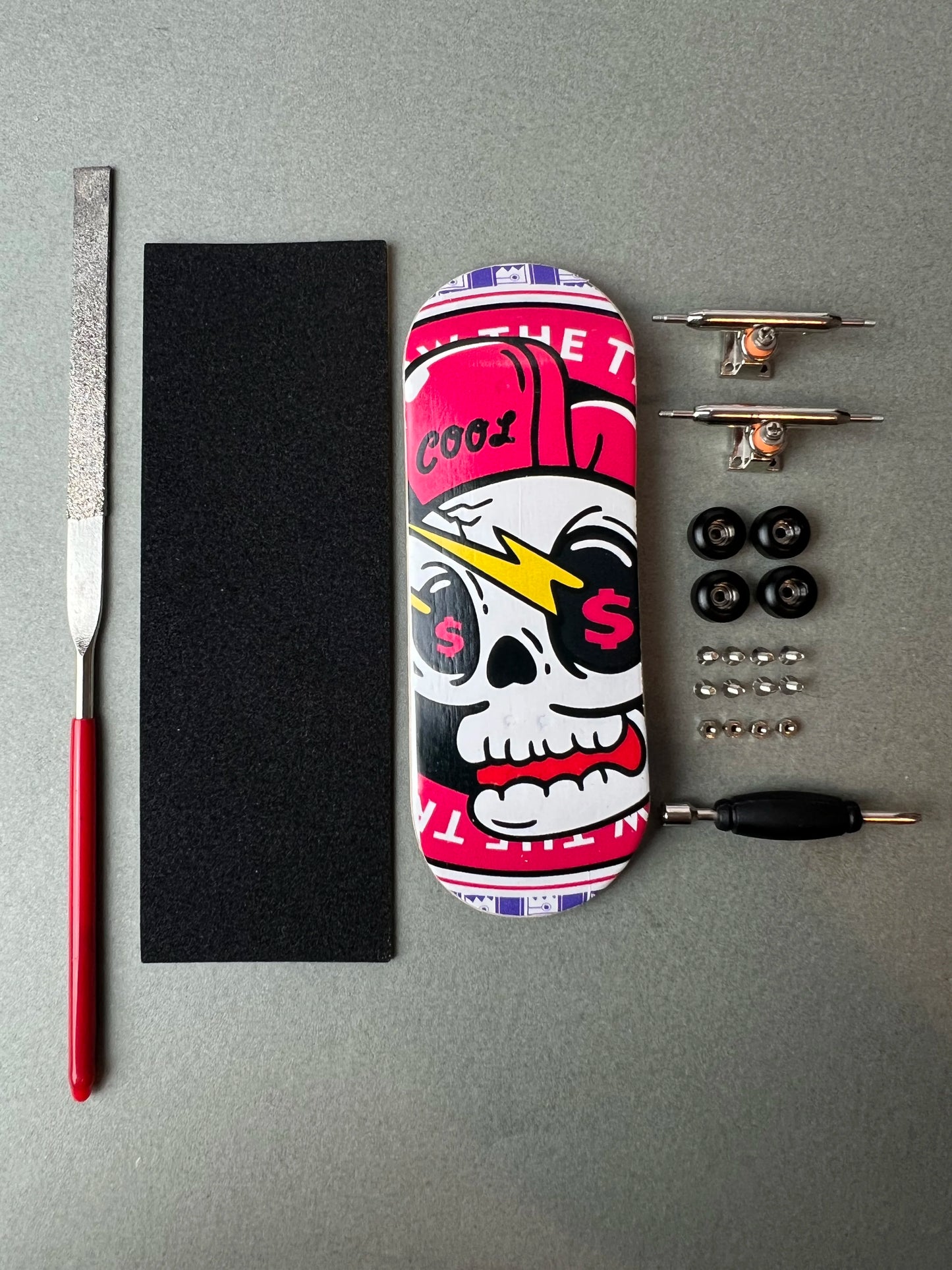 Death Gold de Finger3flip, fingerboard Pro de 34 mm, detalle de la tabla montada