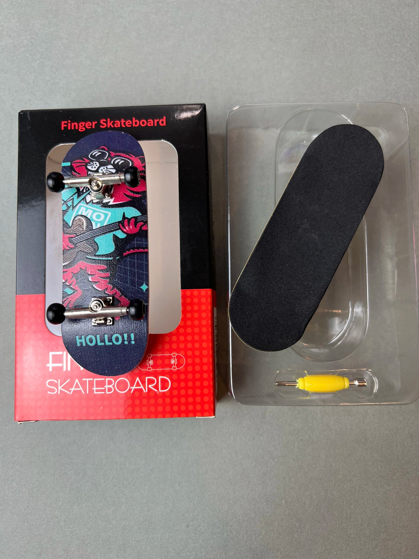 Gato Guitarra Hollo de Finger3flip, fingerboard de 34 mm de perfil, con la concavidad de la tabla y los ejes a la vista