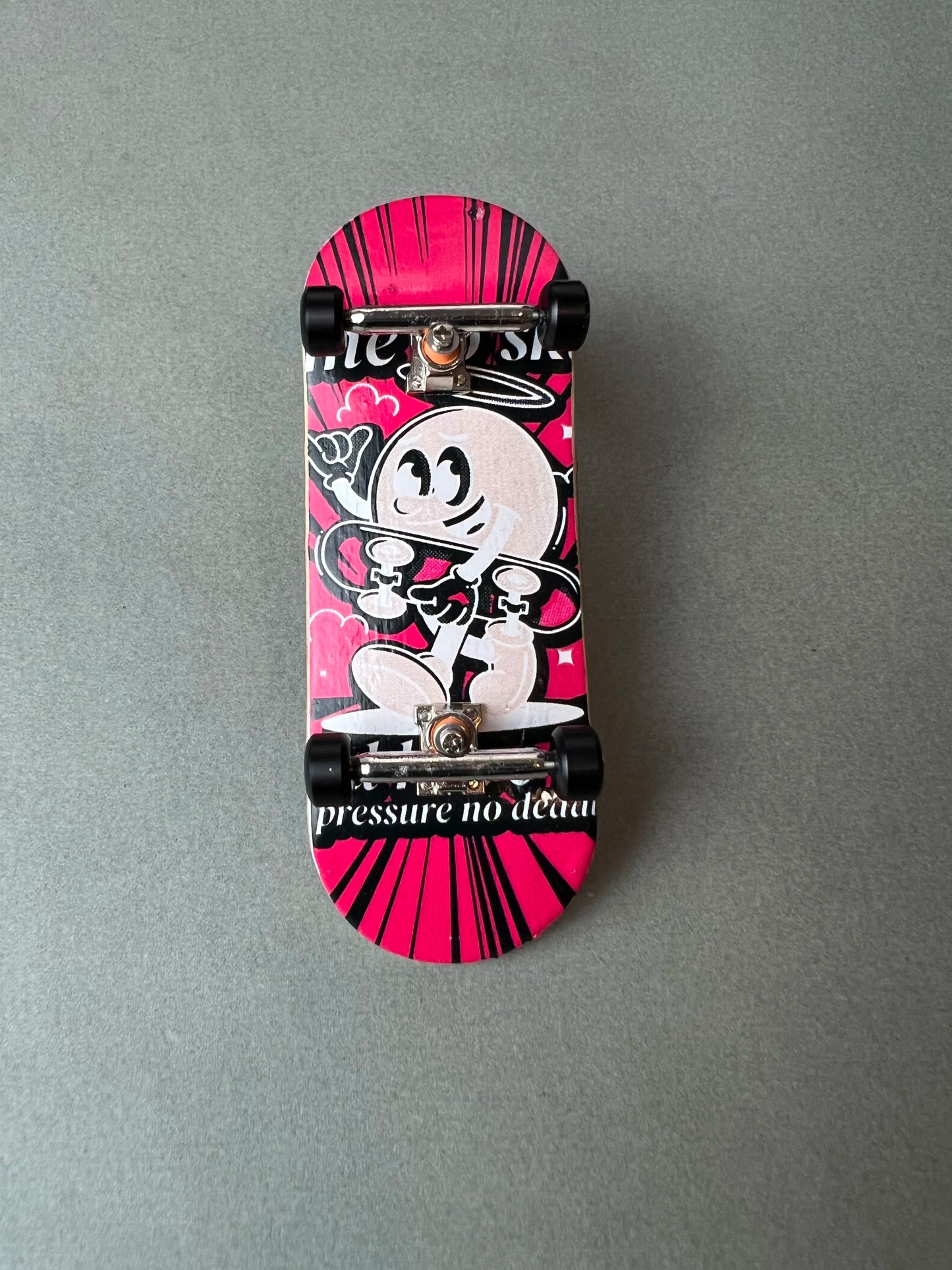 34 mm Passion Deck Pro fingerboard with a cupid graphic
