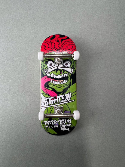 Jungle Fury de Finger3flip, fingerboard Pro de 34 mm con gráfico de monstruo verde visto desde abajo